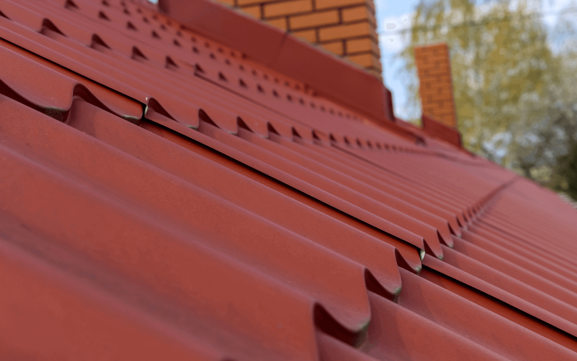 Close up of metal corrugated roof sheets on house